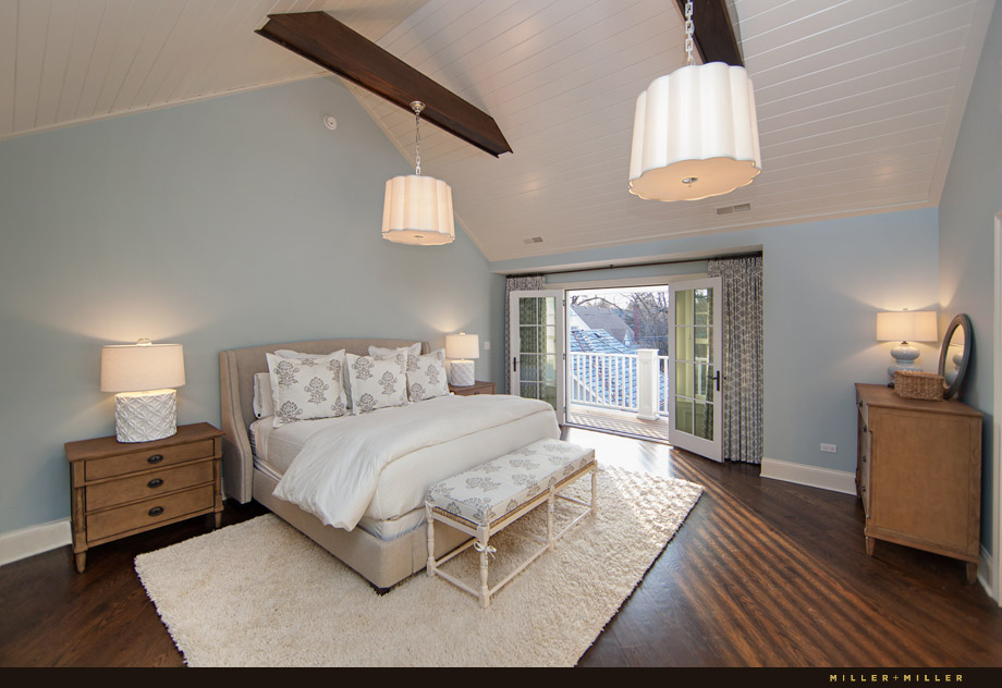 vaulted white plank ceiling contrasting dark beams